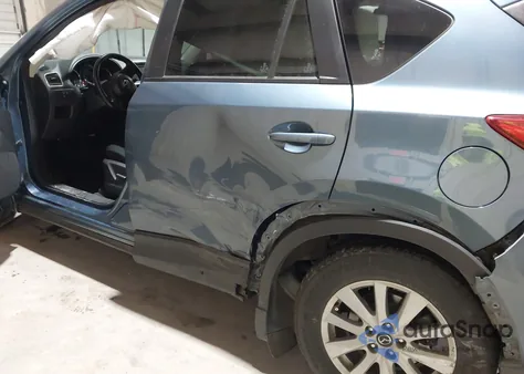 2016 Mazda Cx-5 Touring z USA, uszkodzony, nr VIN JM3KE2CY4G0899910